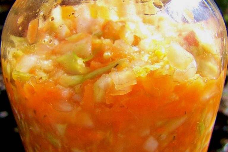 A jar of fermented cabbage and carrot sauerkraut