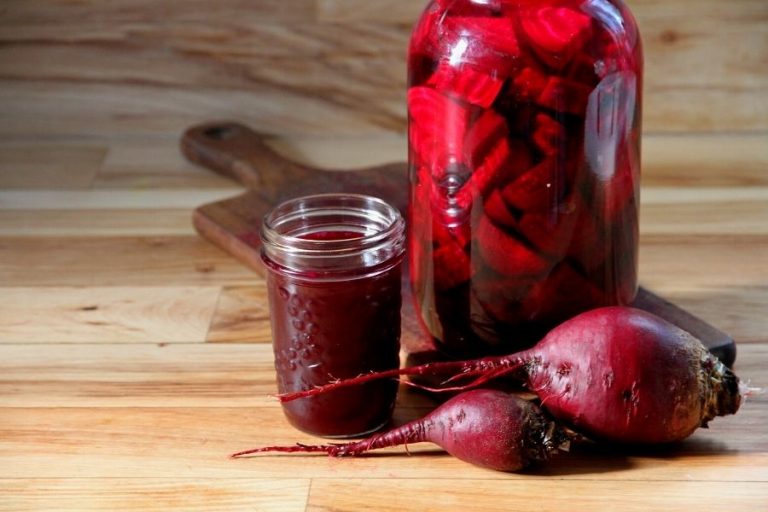 a pretty display of beets, wild fermented beet kvass and a jar full of fermenting beets