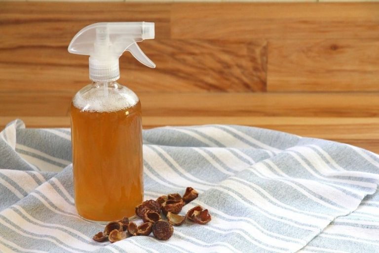 A spray bottle holding my diy natural bathroom cleaner recipe