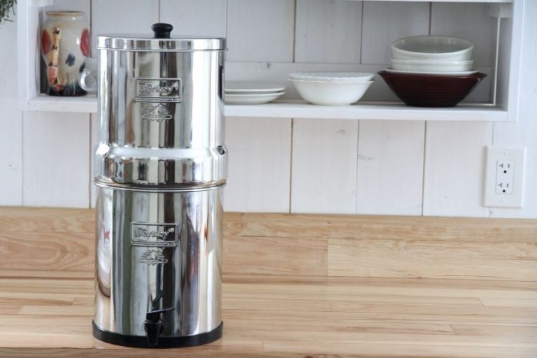 An assembled, Berkey water filter sitting on the kitchen countertop.