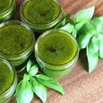 4 oz (125 ml) jars of basil sauce topped in a light layer of olive oil