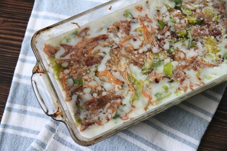 a loaf pan with finished head cheese that is ready for eating