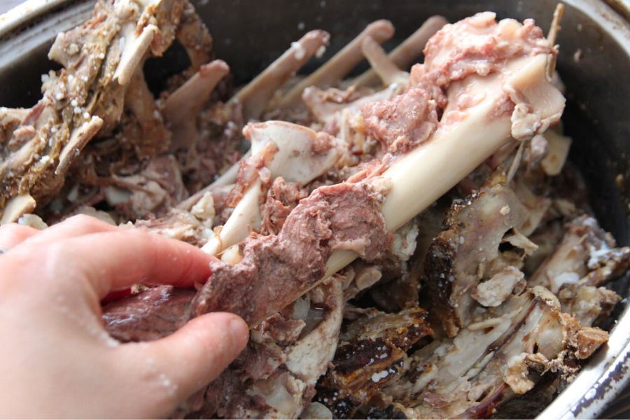 A roaster of deer bones with cooked meat