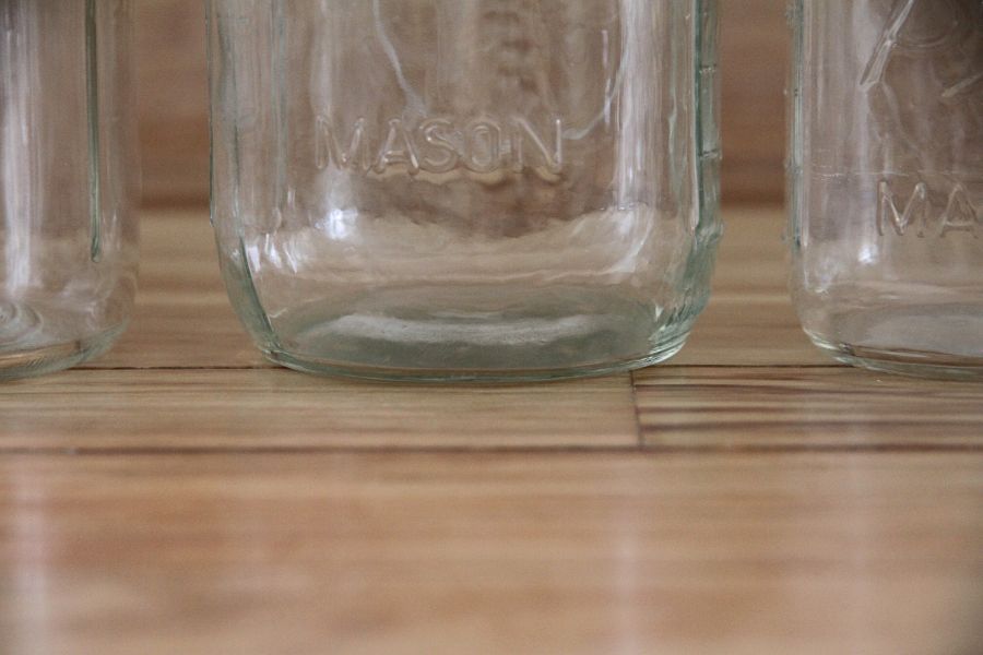 The rounded bottom of a glass canning jar.