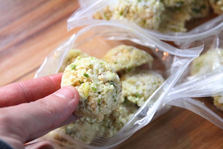 Pats of frozen garlic in bags.