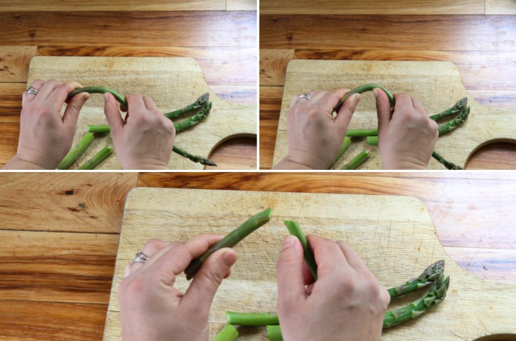 Snapping the tough ends from stalks of asparagus, so they're ready to freeze.