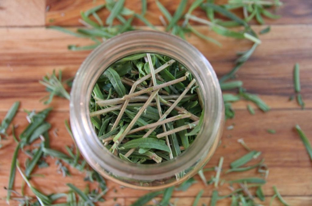 A quart (1 litre) jar filled with chopped, fresh lavender.