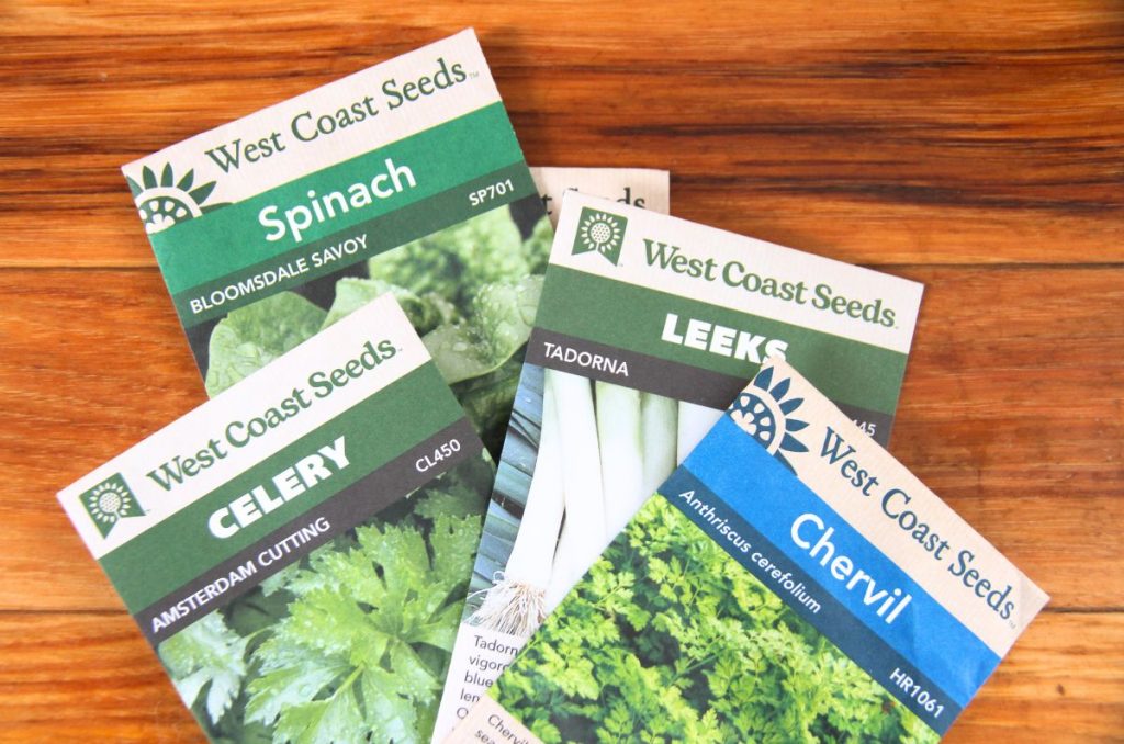 A pile of seed packages with clear labels for the buyer to read.