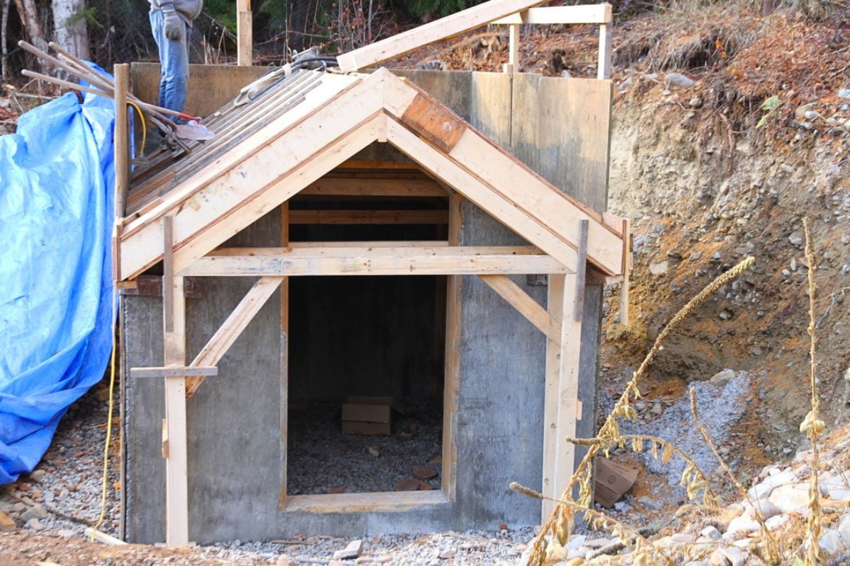 Framework on top of concrete root cellar walls that will hold the roof forms. 