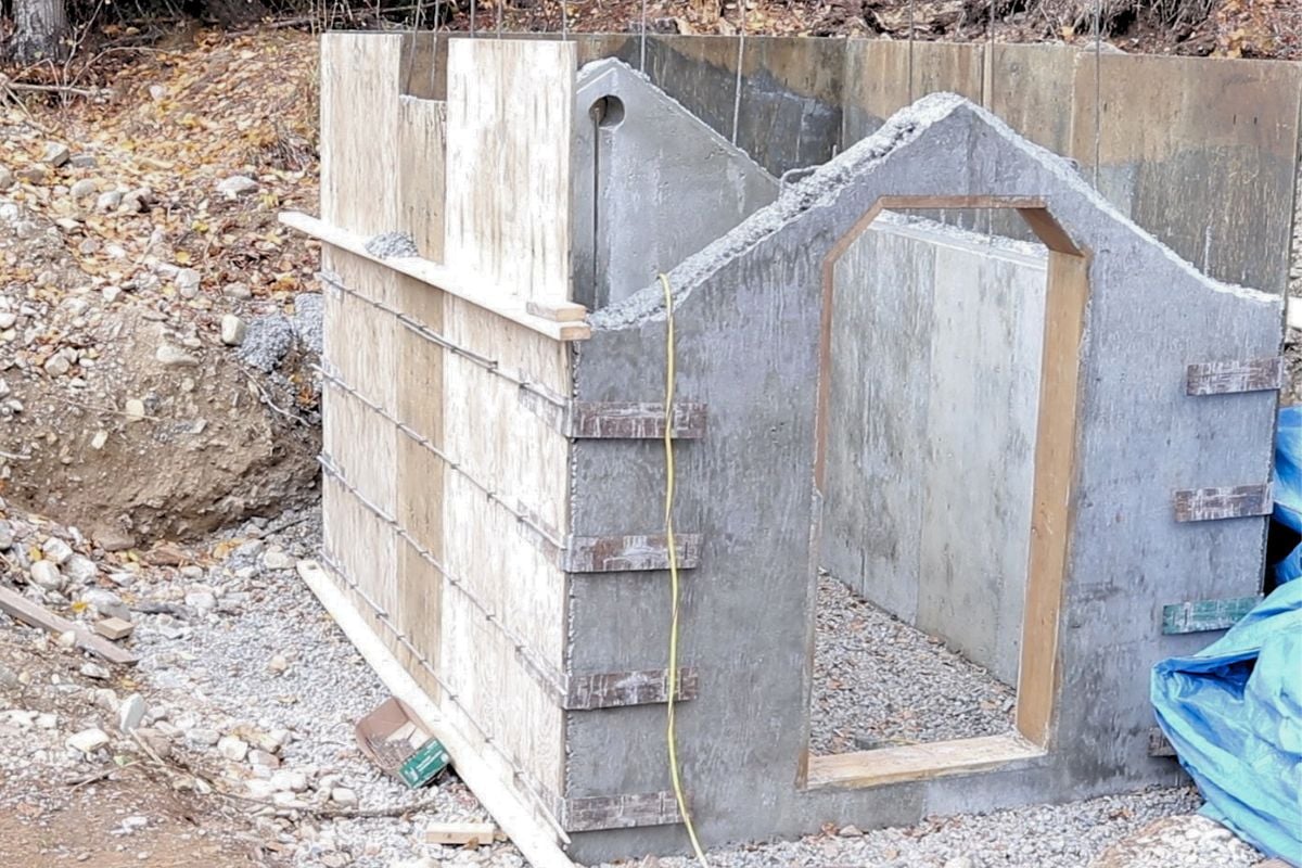 The concrete walls of the root cellar, before the roof is formed and poured. 